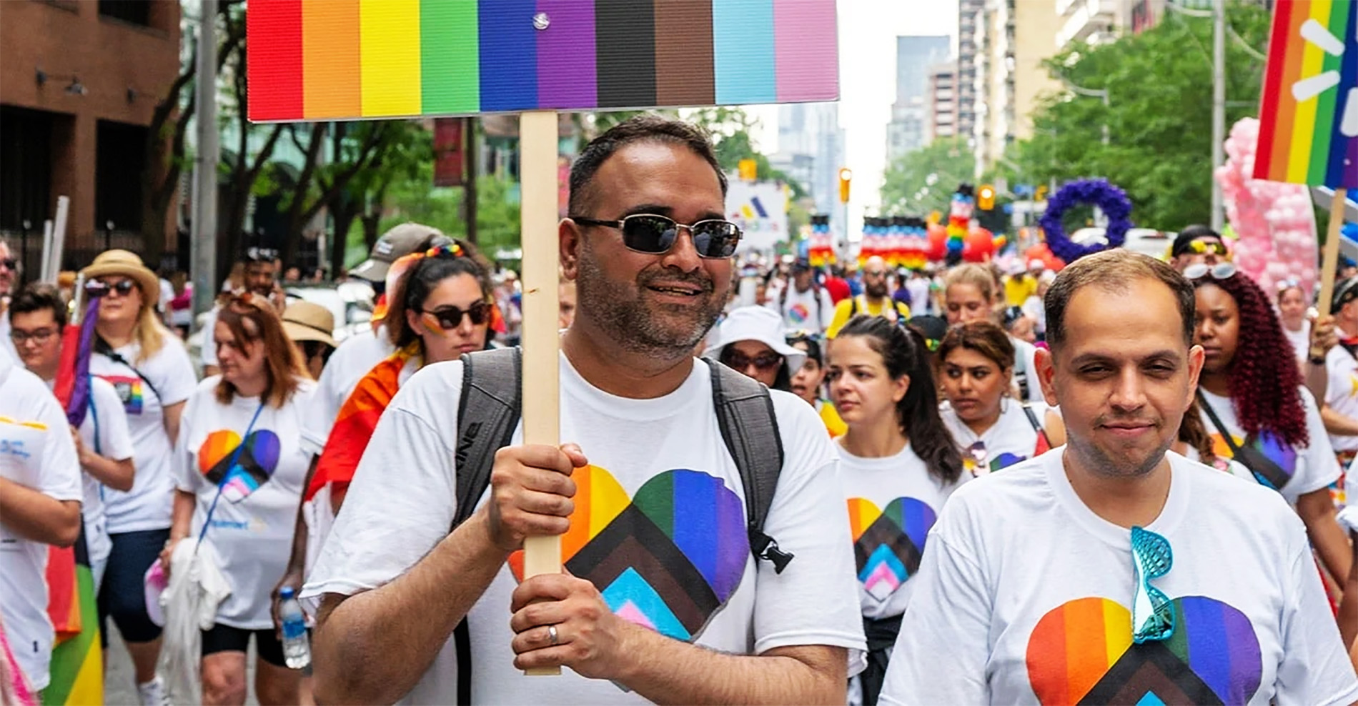 LGBT Supporter holding signs